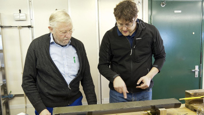 Michael Strasser (right), then assistant professor at ETH Zurich, and expedition leader Gerold Wefer, professor at MARUM, discuss the core of the drill on board the research vessel Sonne. Photo: MARUM - Center for Marine Environmental Sciences, University