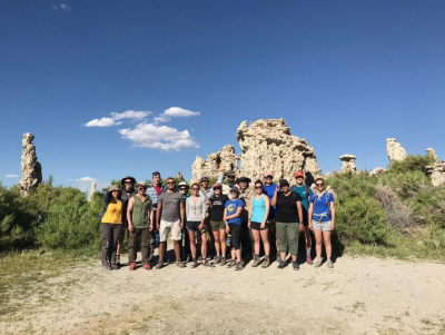 Geobiology cohort at Mono Lake with giant Tufa as the background, California
