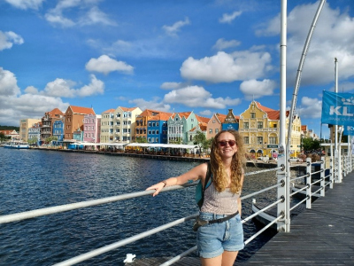 Bianca in front of the iconic Dutch houses of Willemstad, Curaçao.