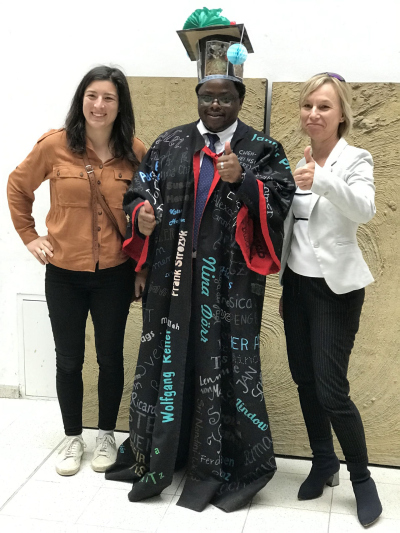 Amon with two of his supervisors