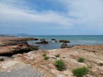 Rocks, water and blue skies