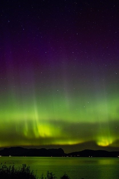 black skies with green lights