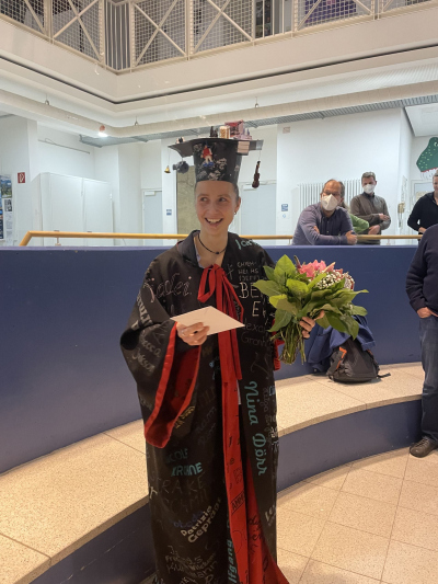Victoria with her doctoral hat and gown