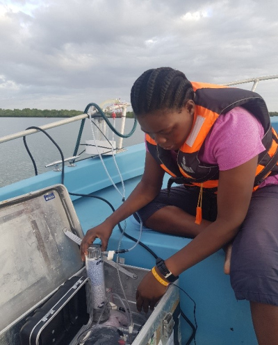 Nancy working on a boat