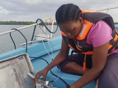 Nancy working on a boat
