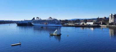 a fjord with two ferries