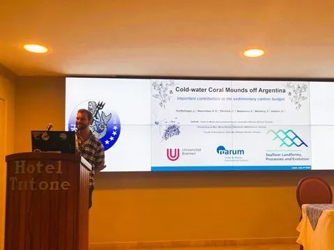 Luis giving his presentation