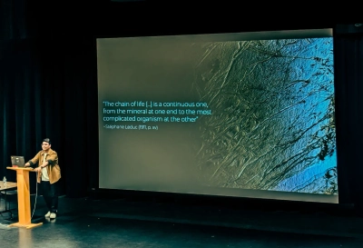 Palash giving his talk