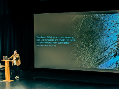 Palash giving his talk