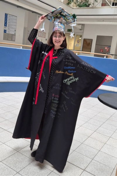 Janina Groninga with her doctoral hat and gown
