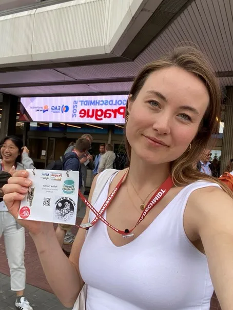Polina with her name tag in her hand.