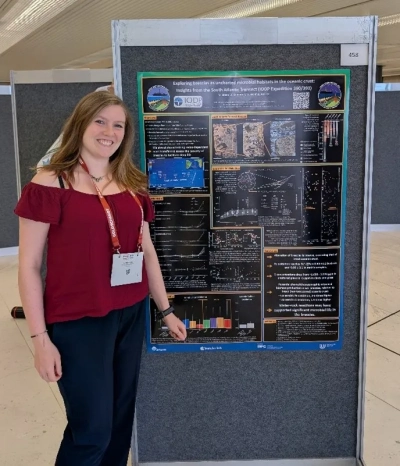 Jule Melina Sophie Krohn next to her poster