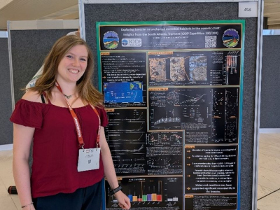 Jule Melina Sophie Krohn next to her poster