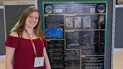 Jule Melina Sophie Krohn next to her poster