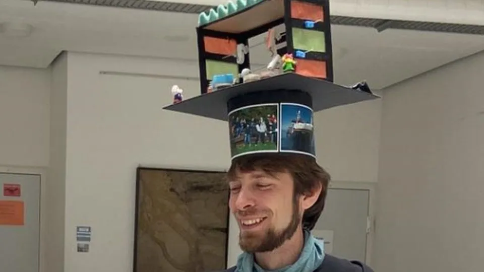 Adrian Höfken with his doctoral hat