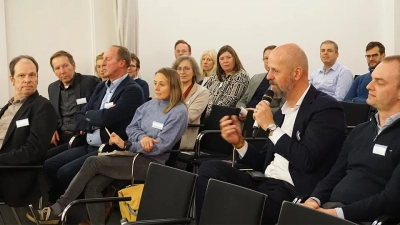 Fragen aus dem Publikum währen der Podiumsdiskussion.