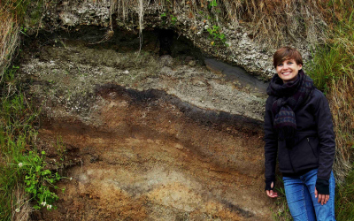 During field trip in front of a volcanic outcrop